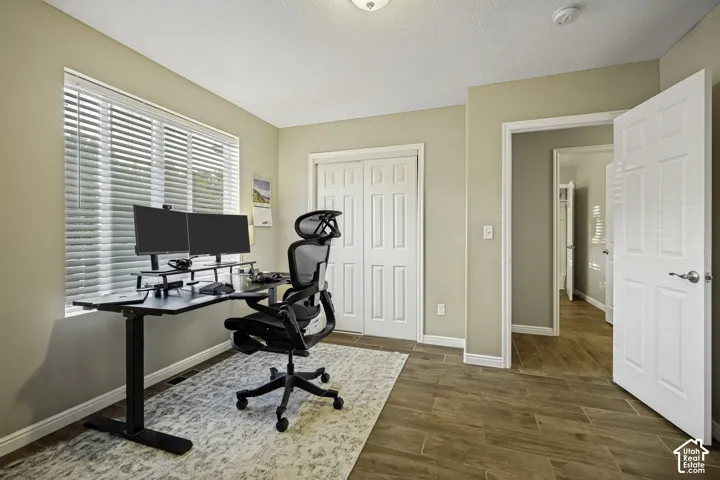 Interior room with wood-finish flooring and a neutral color palette