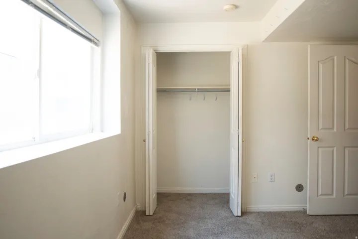 Recessed window featuring horizontal blinds