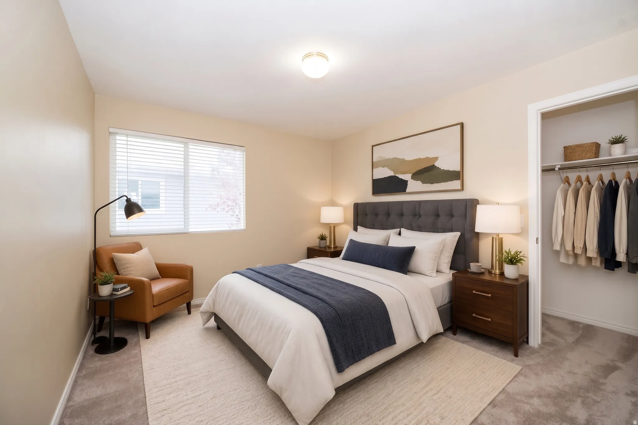 Soft gray carpeting, built-in closet, and a neutral color palette