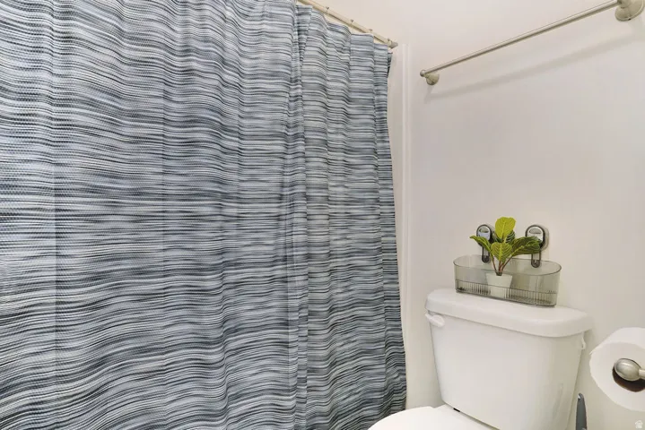 White ceramic toilet with a matching tank