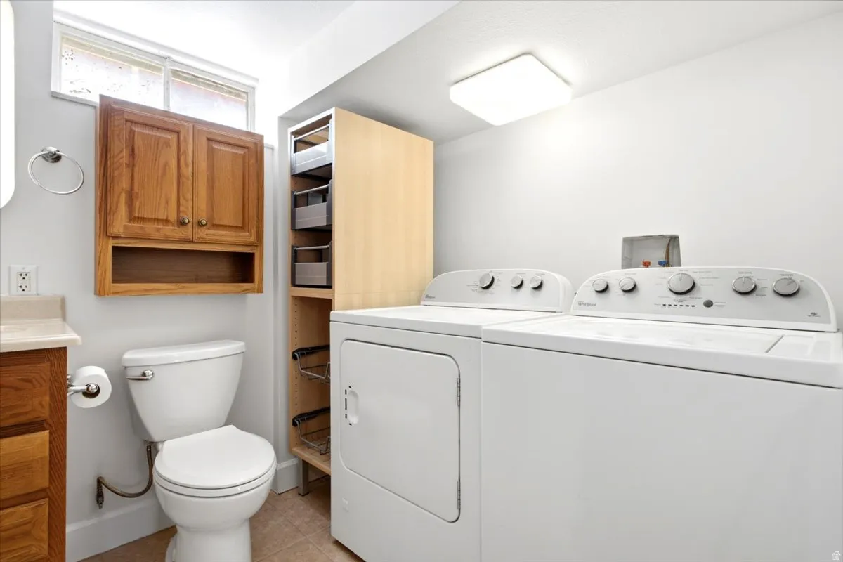 Full-size laundry appliances with additional storage shelving