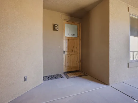 Solid wood entry door with opaque glass panel