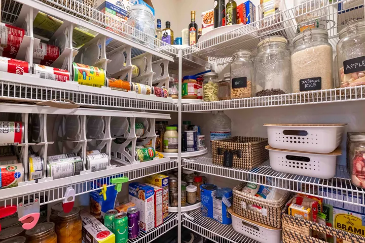 Custom pantry with wire shelving, and ample storage for kitchen essentials
