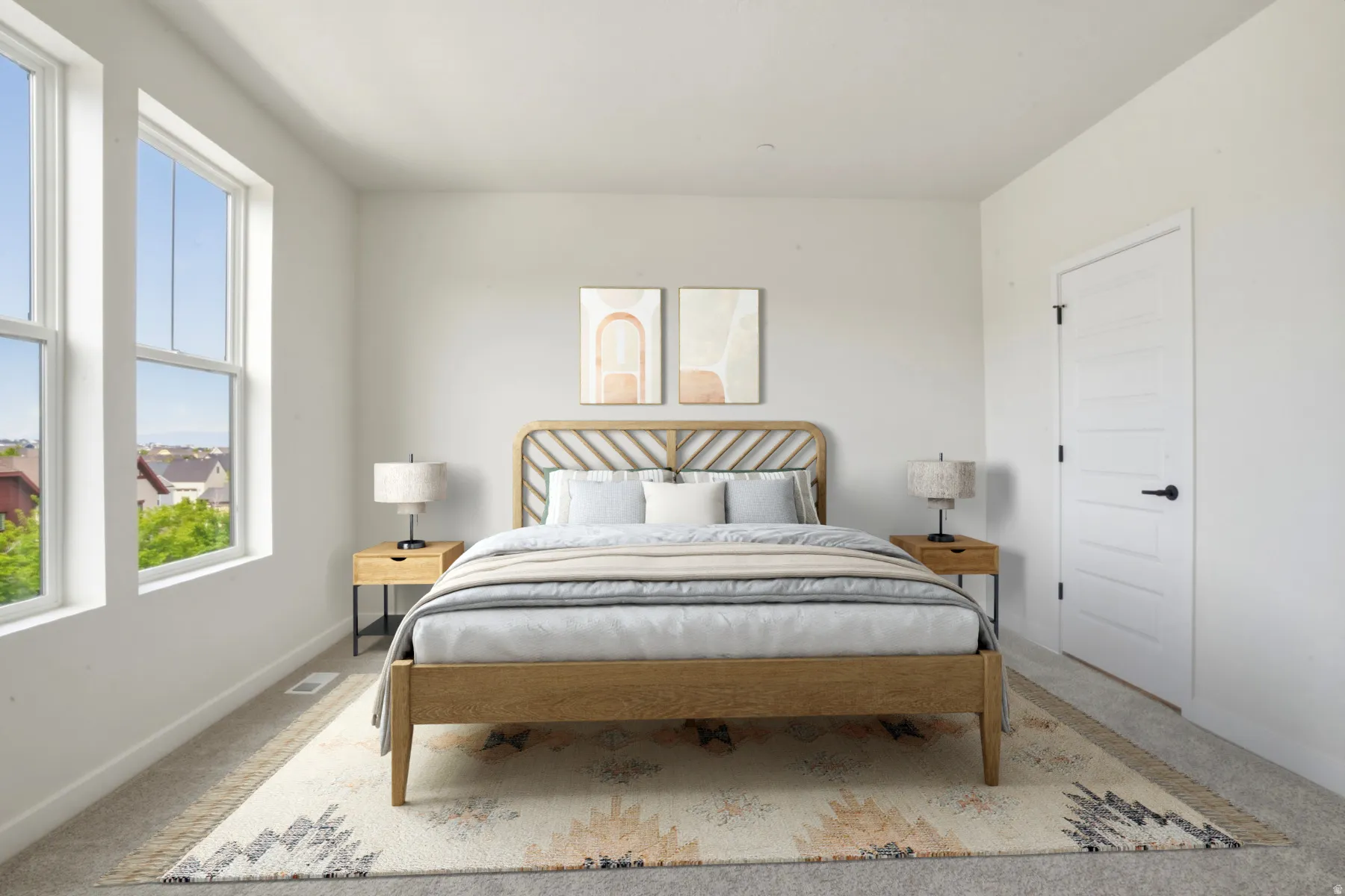 Bright interior space featuring a light-colored carpet, white walls, and a contemporary five-panel interior door with matte black hardware