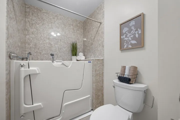 Bathroom featuring a walk-in tub