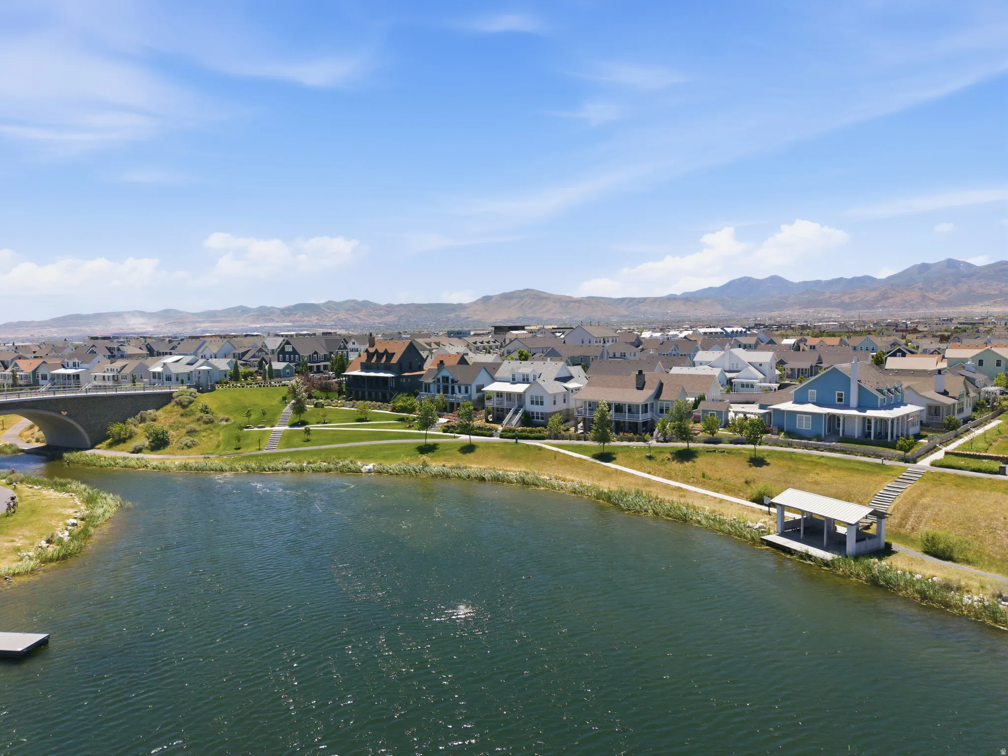 Expansive water feature with a dock and covered structure