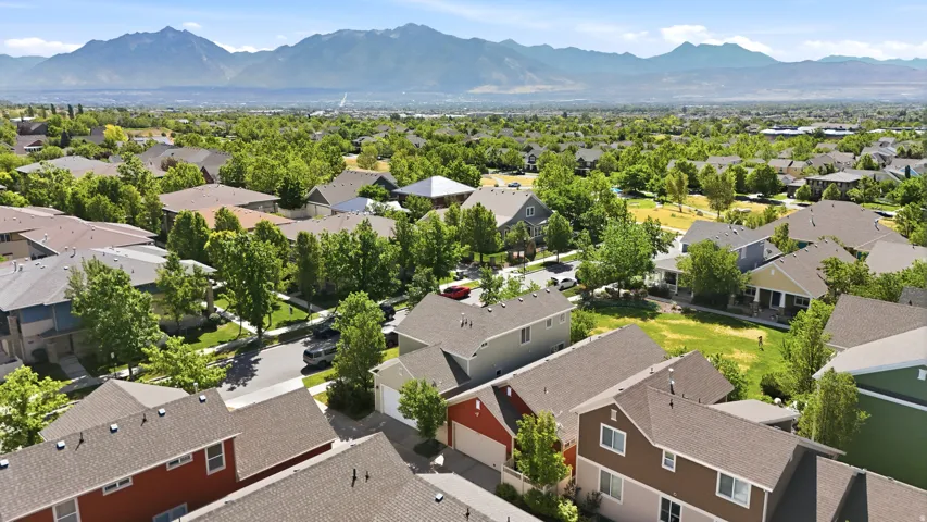 Expansive residential neighborhood featuring numerous detached properties with pitched roofs