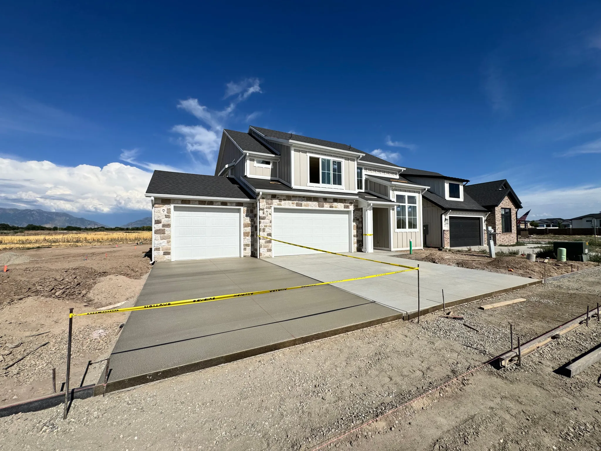 Contemporary exterior featuring a stone and siding facade