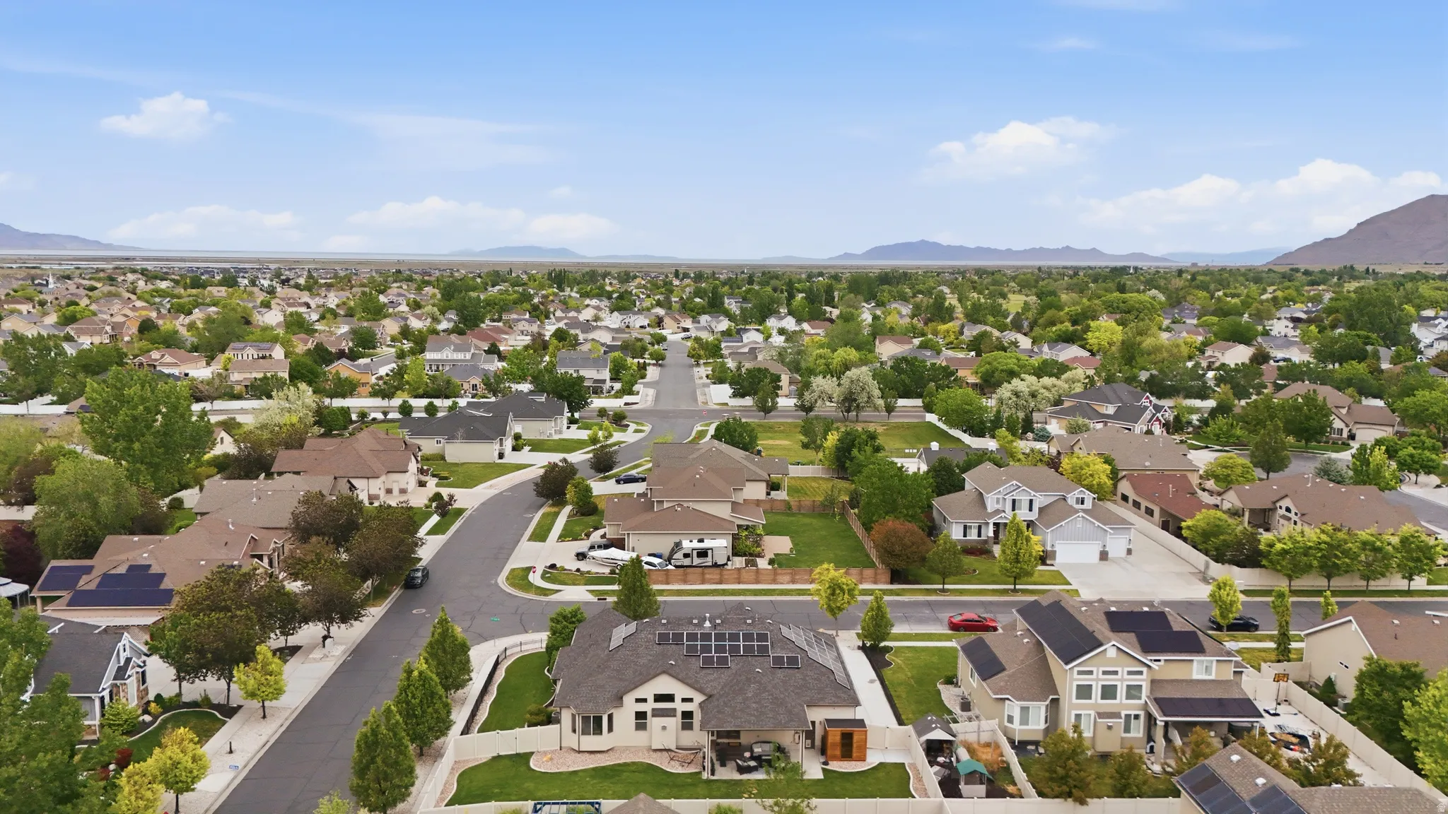 Residential neighborhood featuring tree-lined streets and varied architectural styles