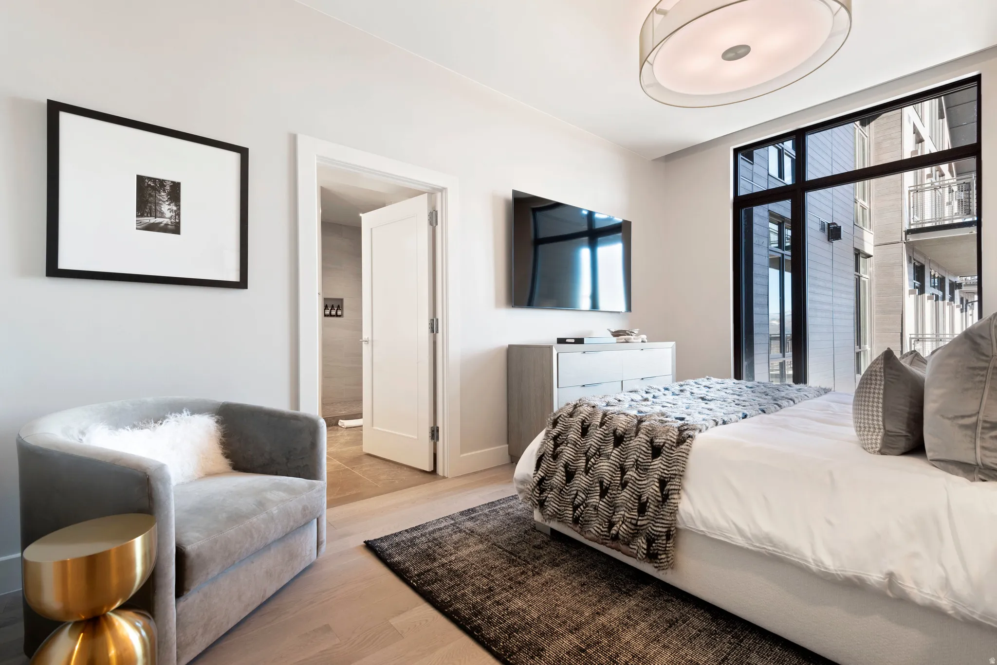 Hardwood-finish flooring complements the neutral wall tones