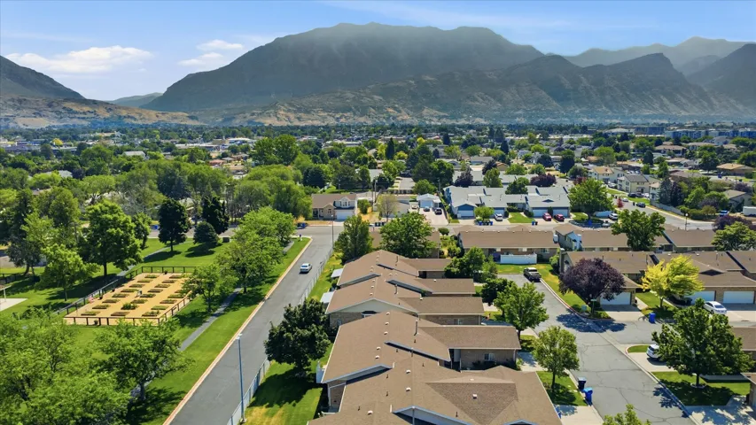 Aerial perspective showcasing a residential area with varied housing structures