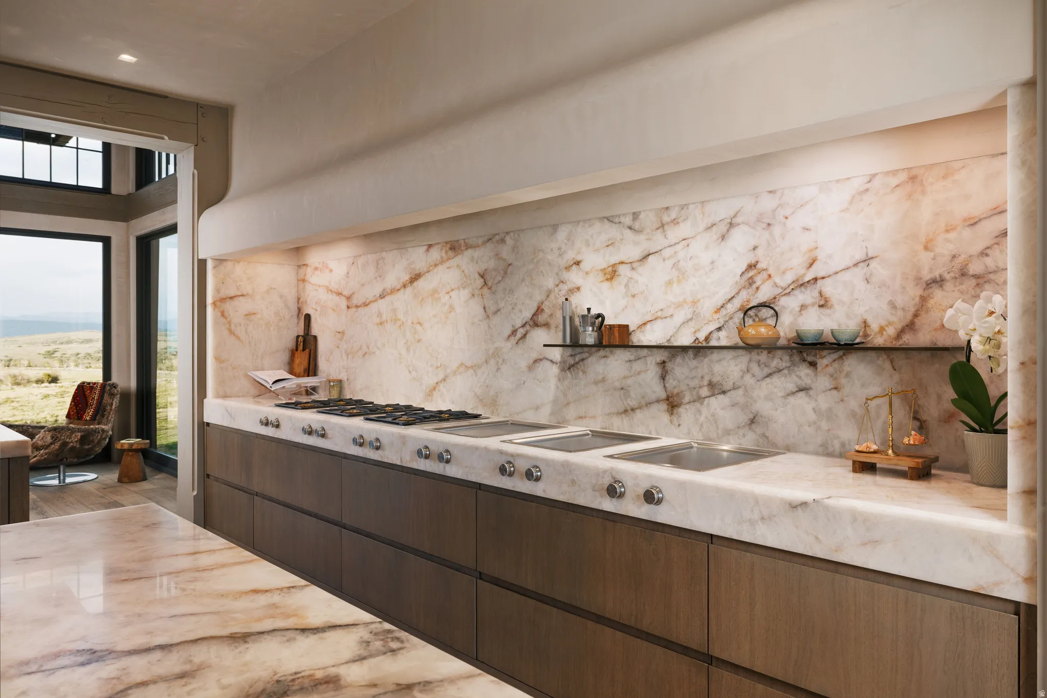 Kitchen featuring an integrated gas cooktop, multiple integrated sinks, stone slab backsplash, stone countertops, and wood-finish cabinetry