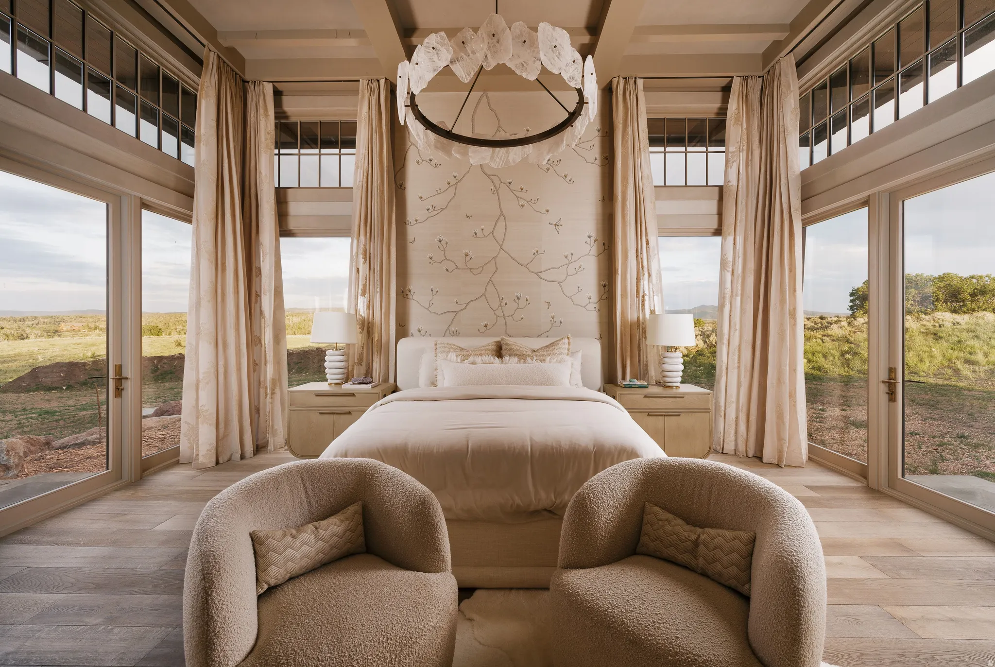 Bedroom featuring wood-finish flooring, full-height glass doors, and clerestory windows