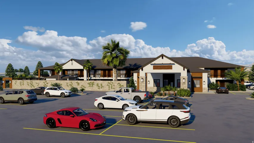 Modern commercial building featuring an expansive asphalt parking lot