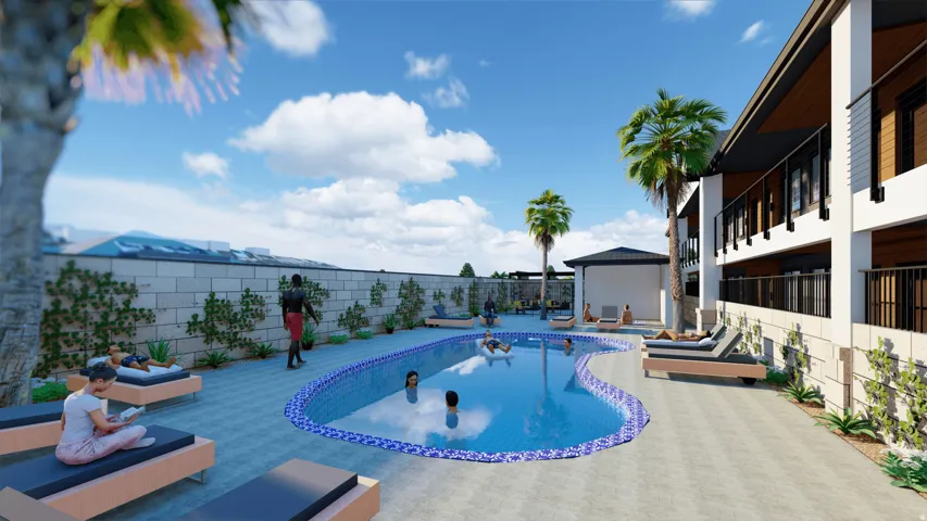Curved swimming pool with blue mosaic tile, surrounded by a paved deck