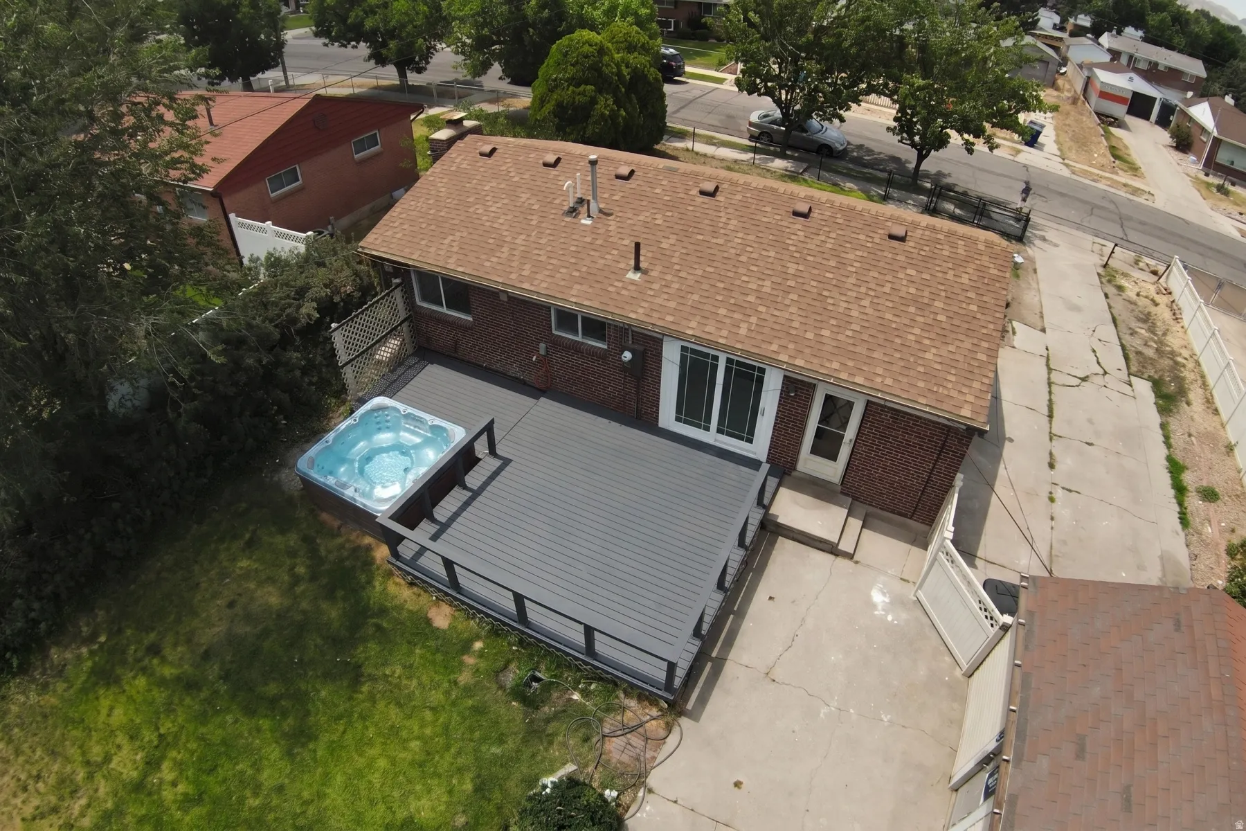 Expansive composite deck featuring an integrated spa