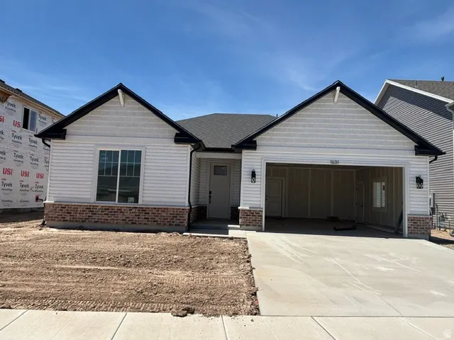 WHITE CRAFTSMAN ELEVATION W/ RED BRICK ACCENT!