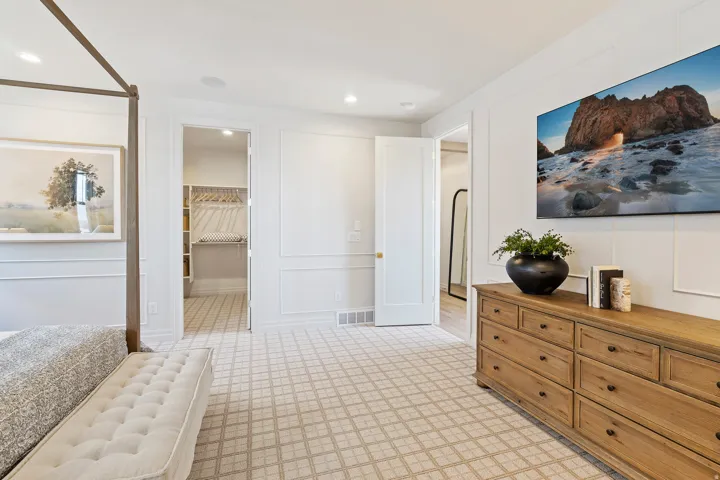 Bedroom featuring wainscoting and recessed lighting