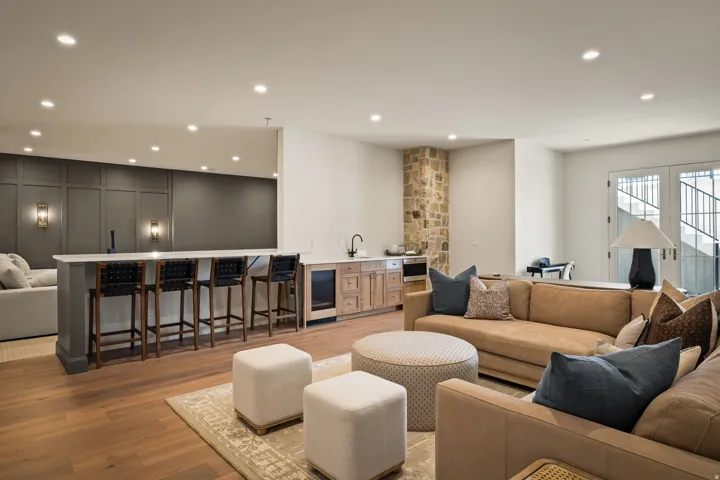 Open-concept living area with wood-finish flooring