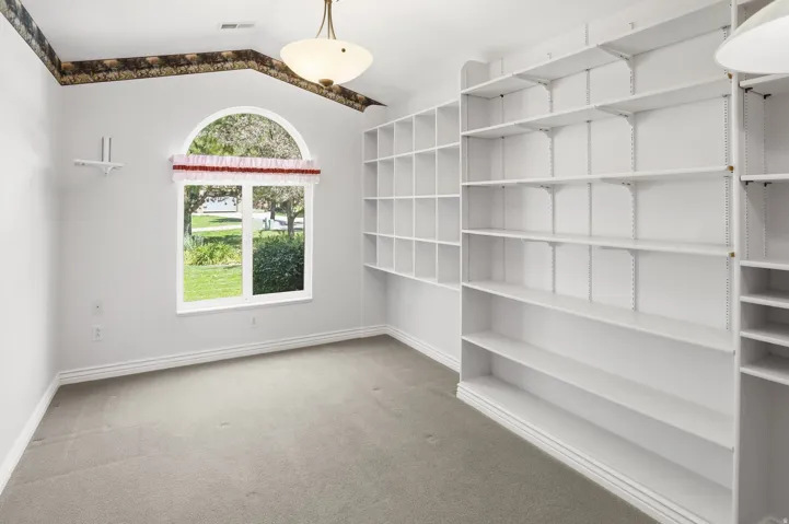 Integrated shelving and built-in cubbies provide substantial storage