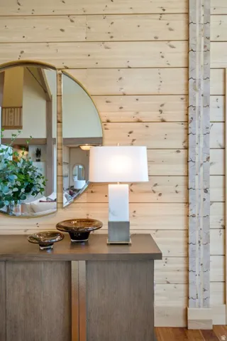 Wood-paneled wall with decorative stone inlay