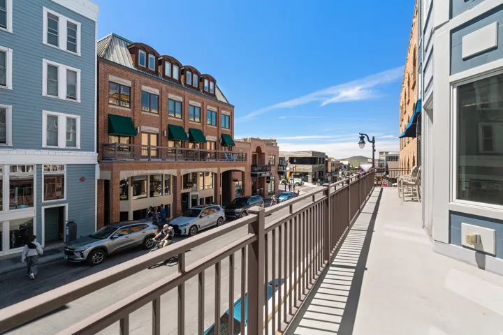 Expansive outdoor balcony with metal railings