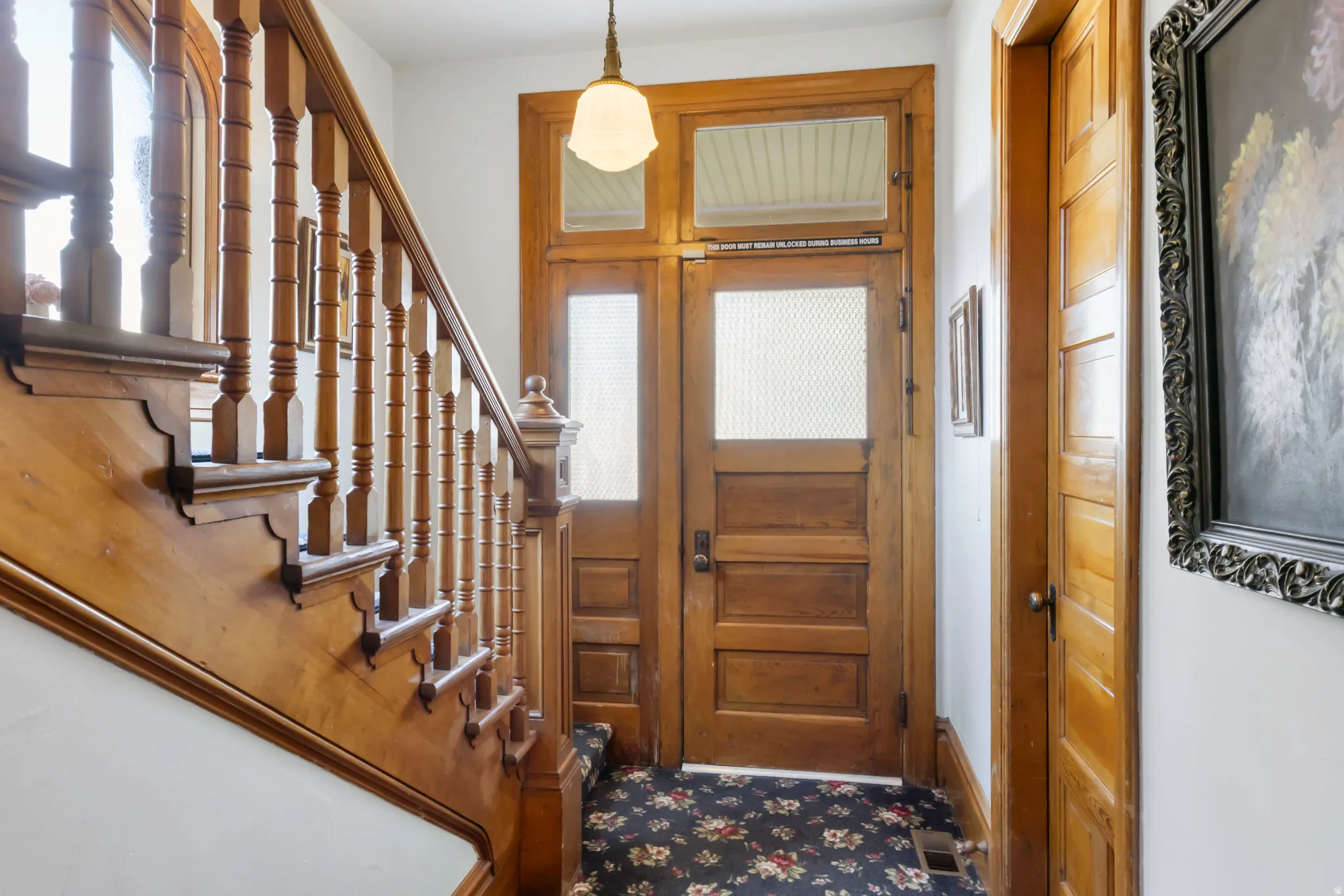Crafted wood staircase with decorative balusters and newel posts