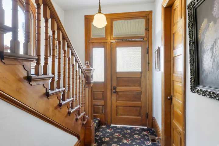 Crafted wood staircase with decorative balusters and newel posts