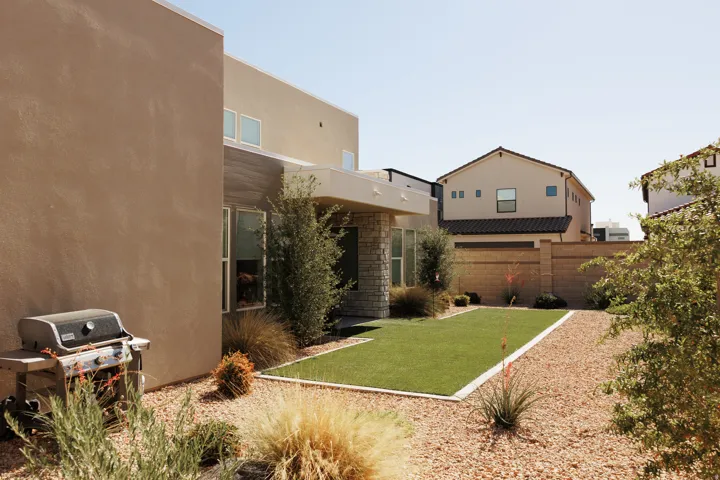 Contemporary exterior featuring stucco and stone accents