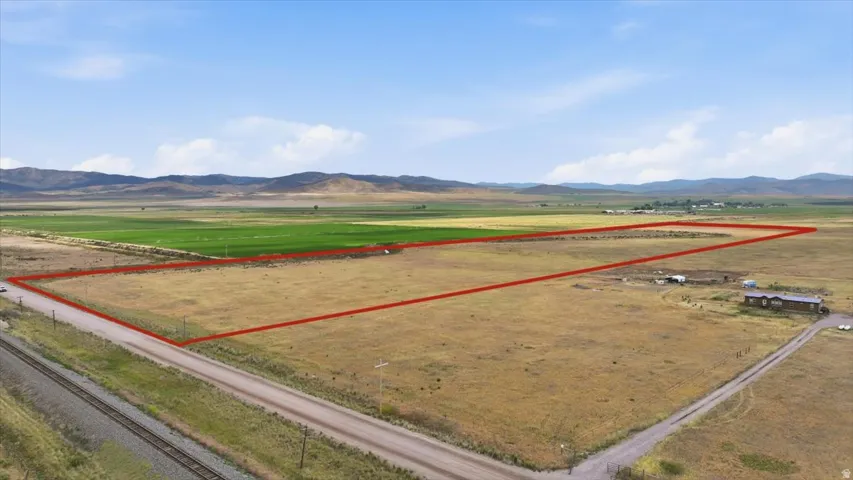 Expansive land parcel with surrounding agricultural fields