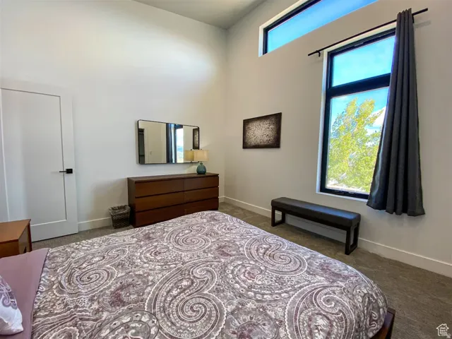 High ceilings complemented by a clerestory window and a large vertical window