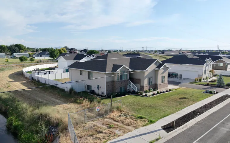 Contemporary two-story residence featuring a combination of siding and brick-finish exterior