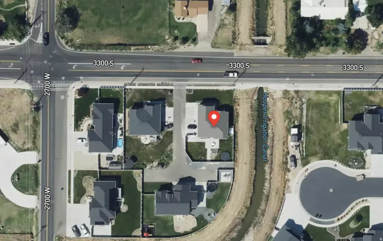 Aerial Map. Depicting the property's location relative to surrounding streets and an irrigation canal