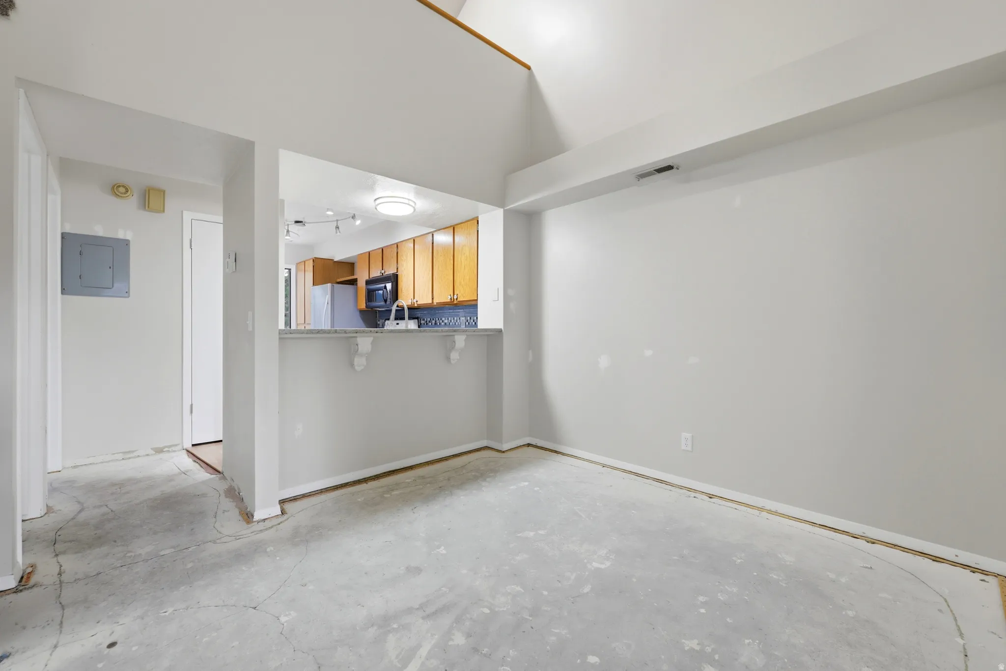 Dining area and view into the kitchen.