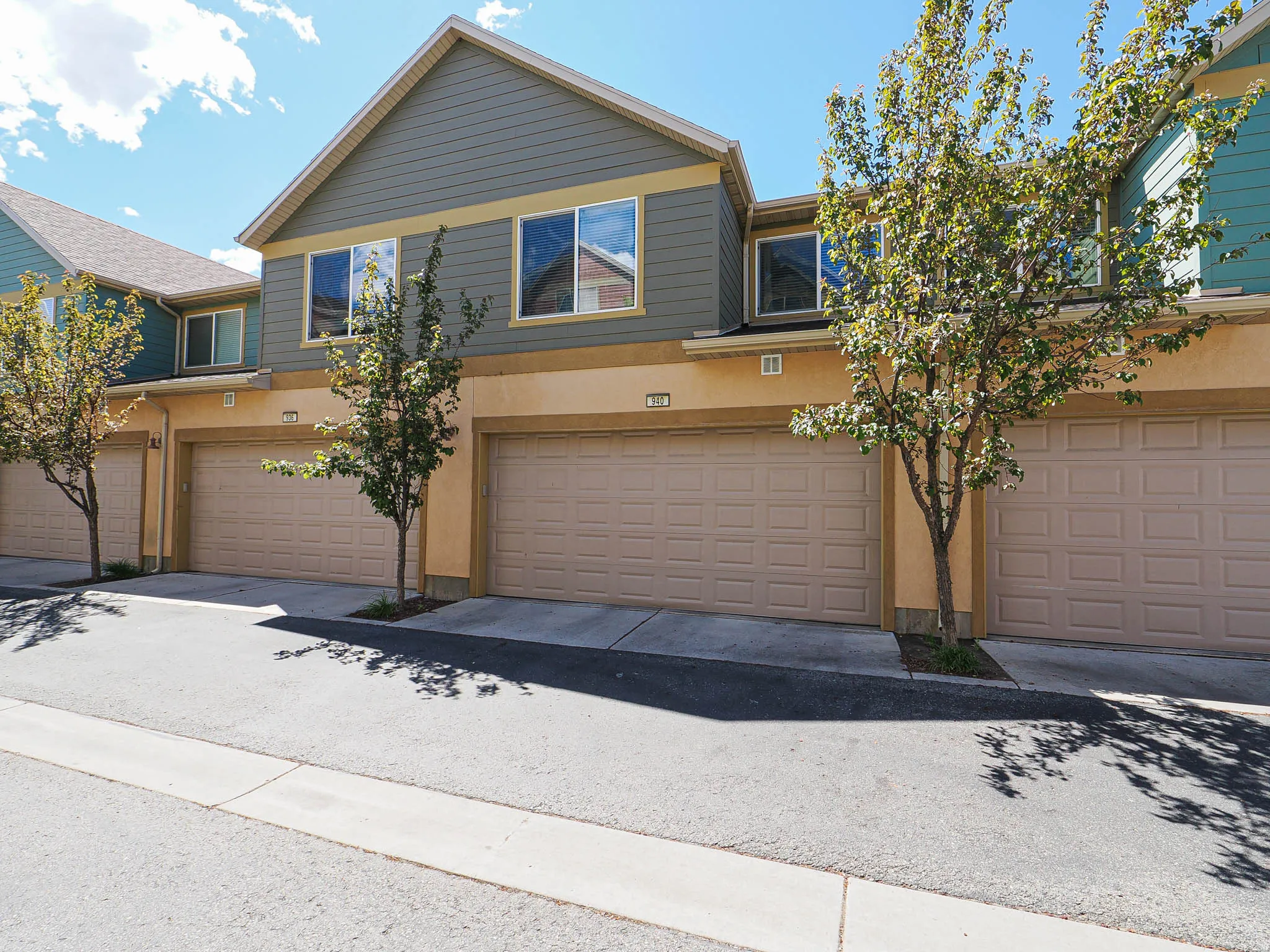 Multi-story exterior with a combination of stucco and siding finishes