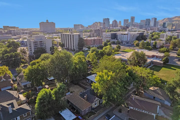Aerial perspective showcasing urban surroundings with a prominent skyline