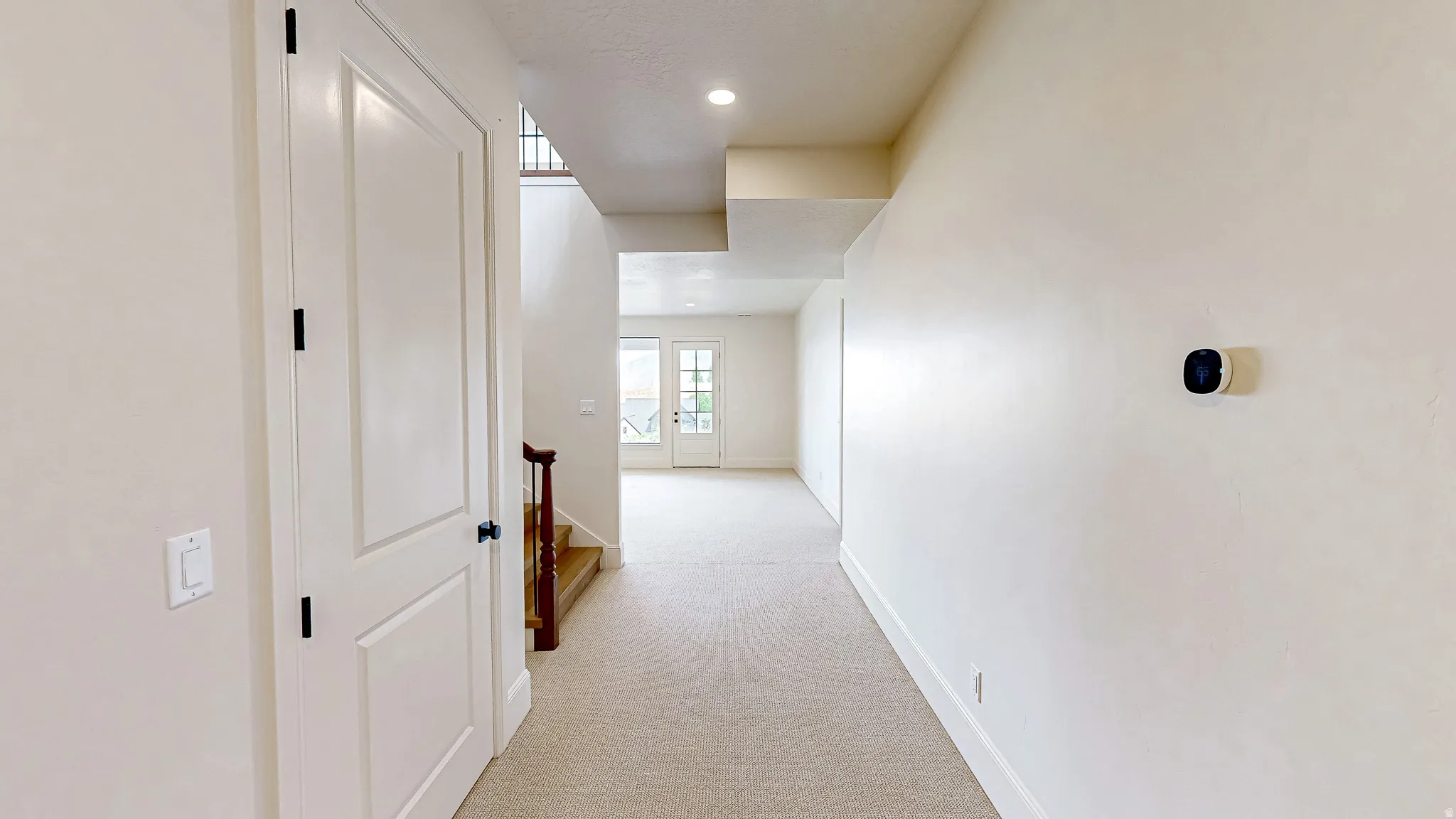 Neutral tone walls with white trim