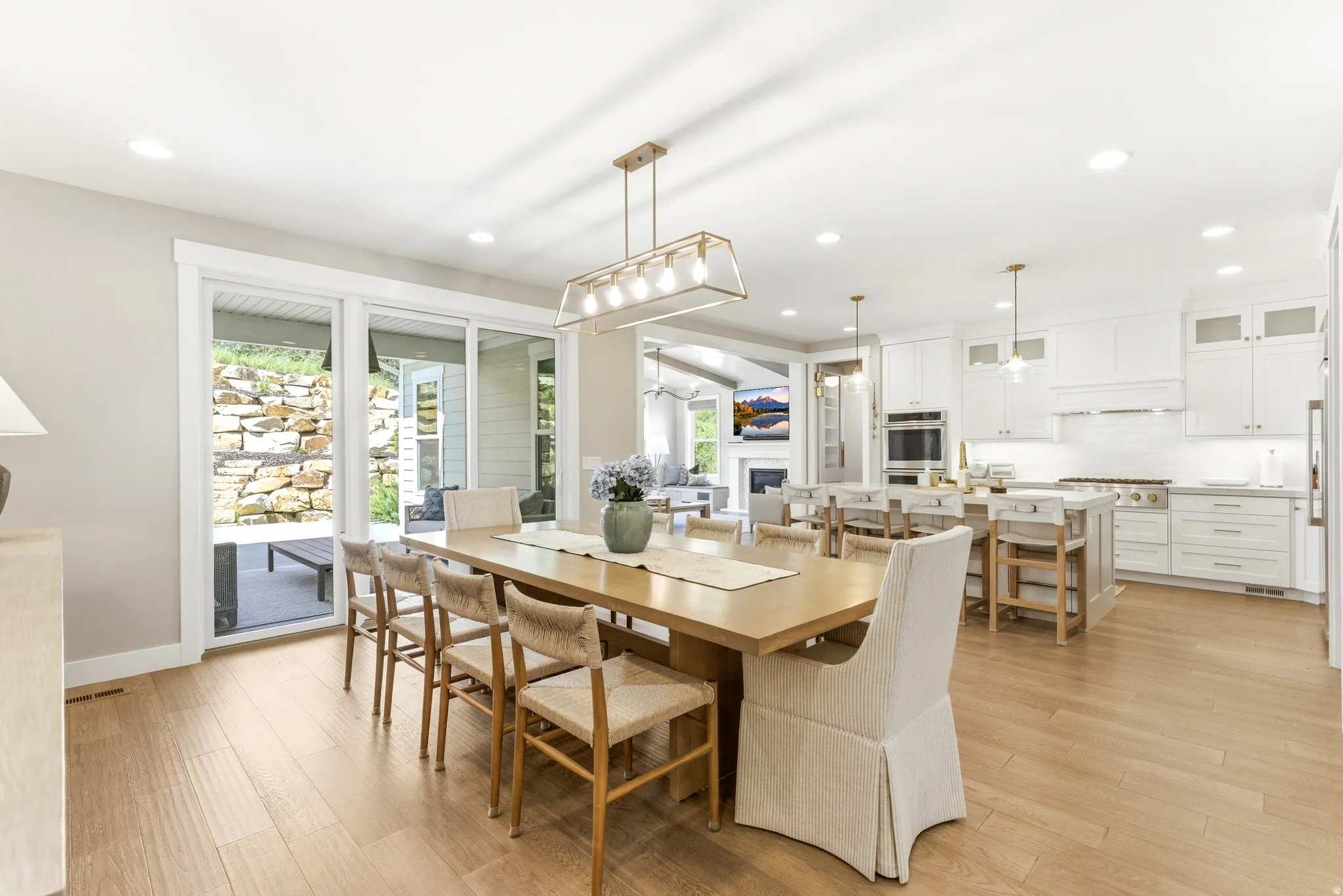 Open-concept living space with wood-finish flooring throughout