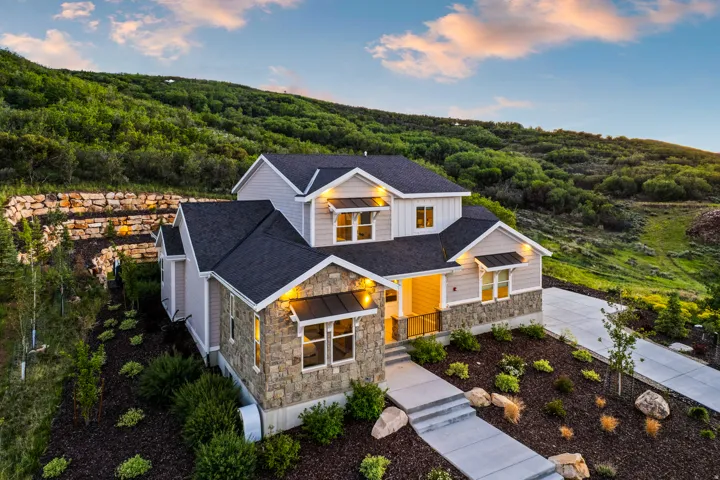 Contemporary home with stone and siding exterior