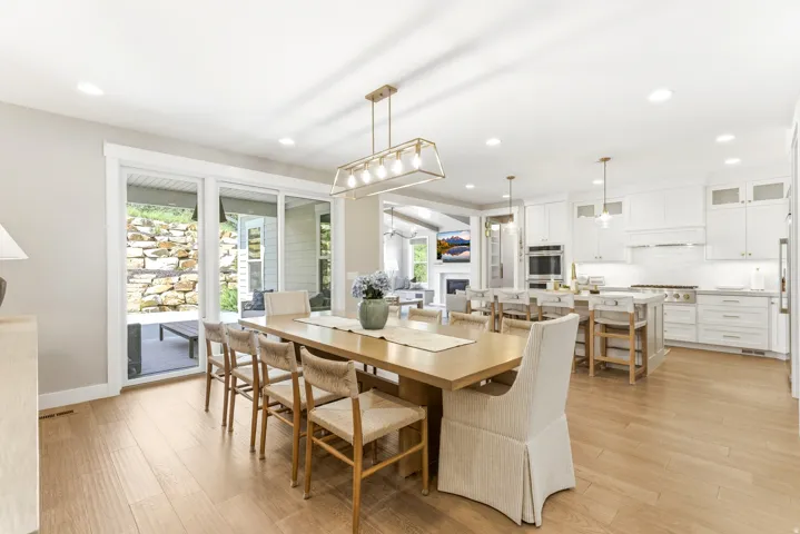 Open-concept living space with wood-finish flooring throughout