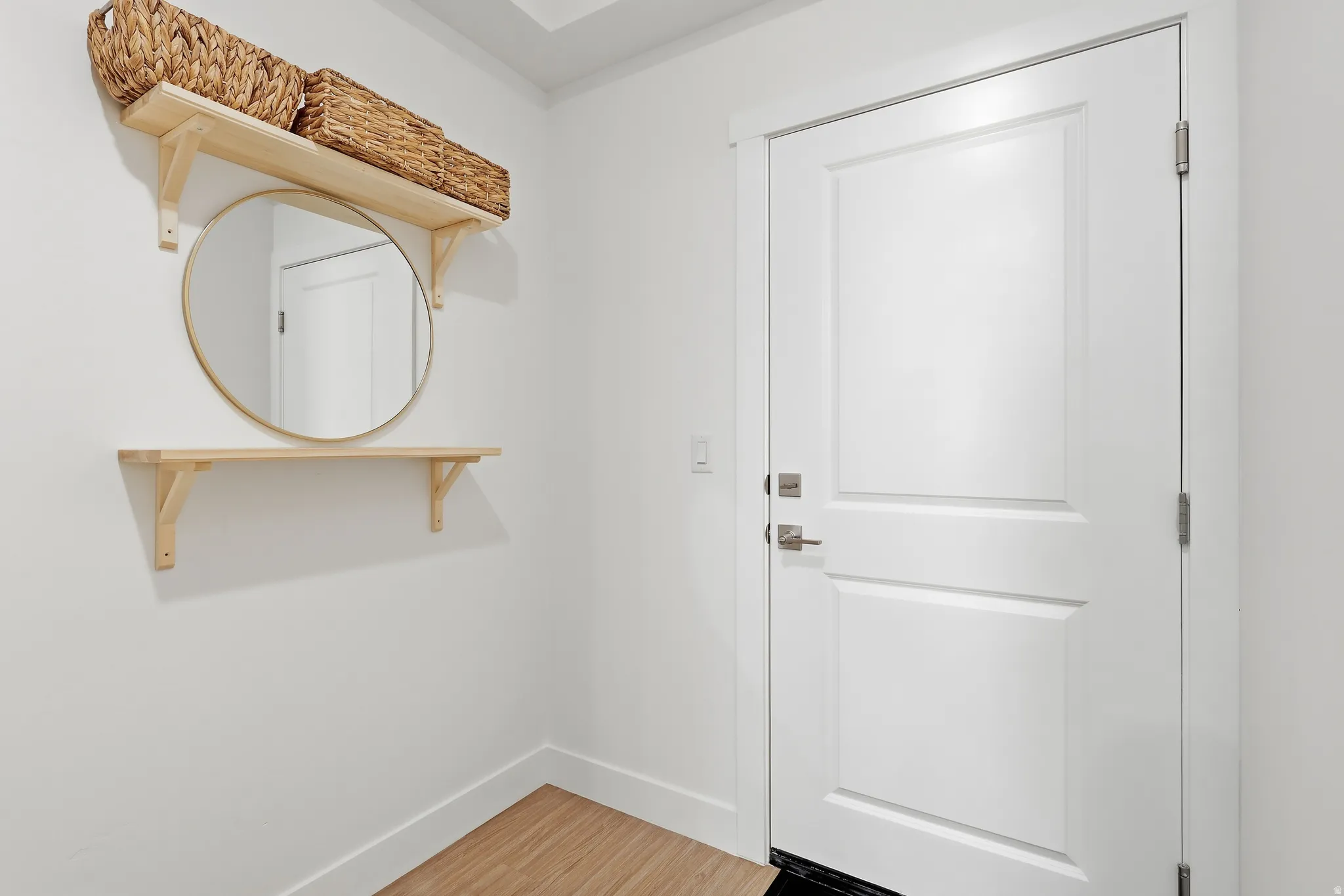Bright white interior door with brushed nickel hardware