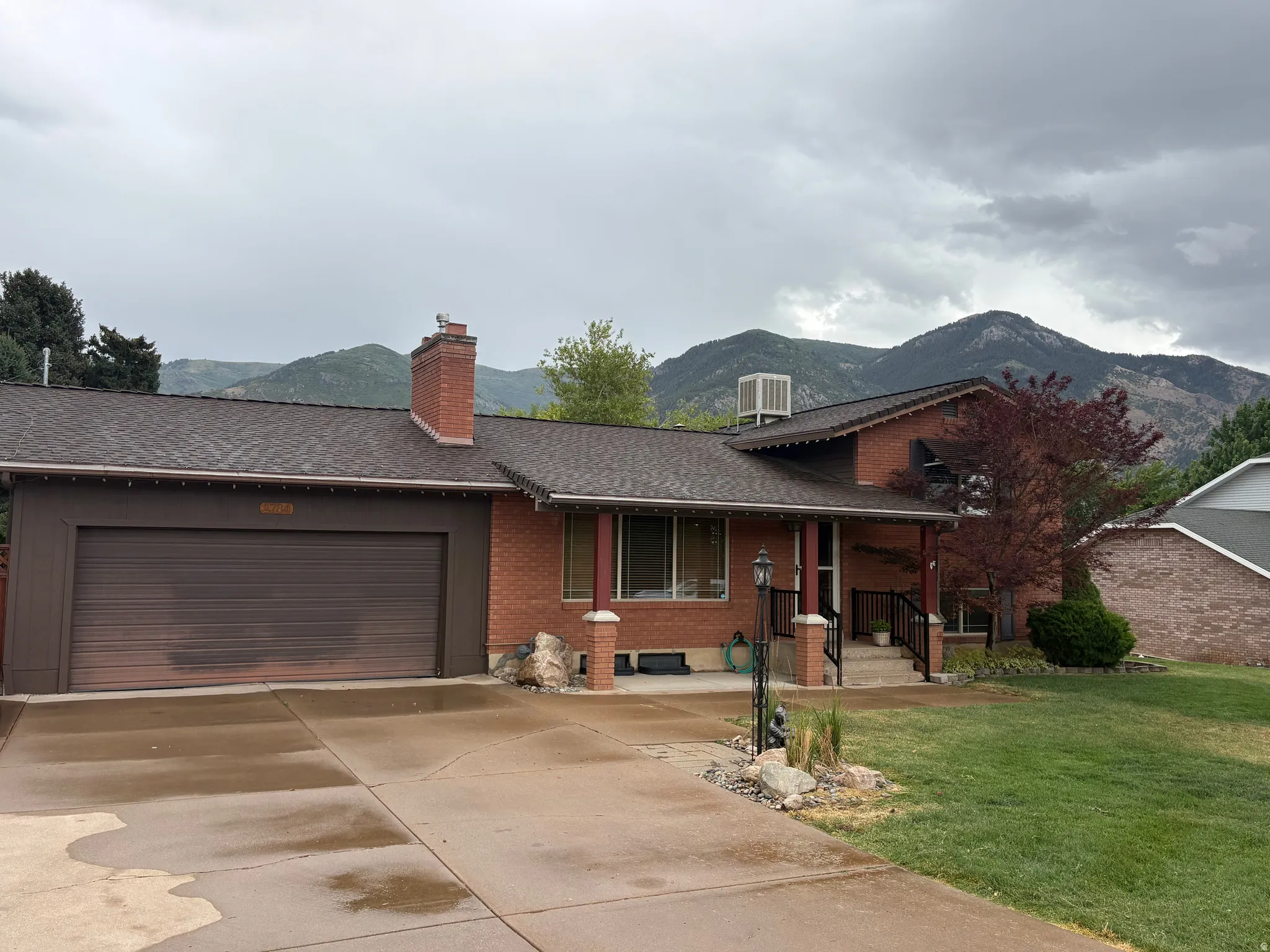 Front of the home, mountains in the background