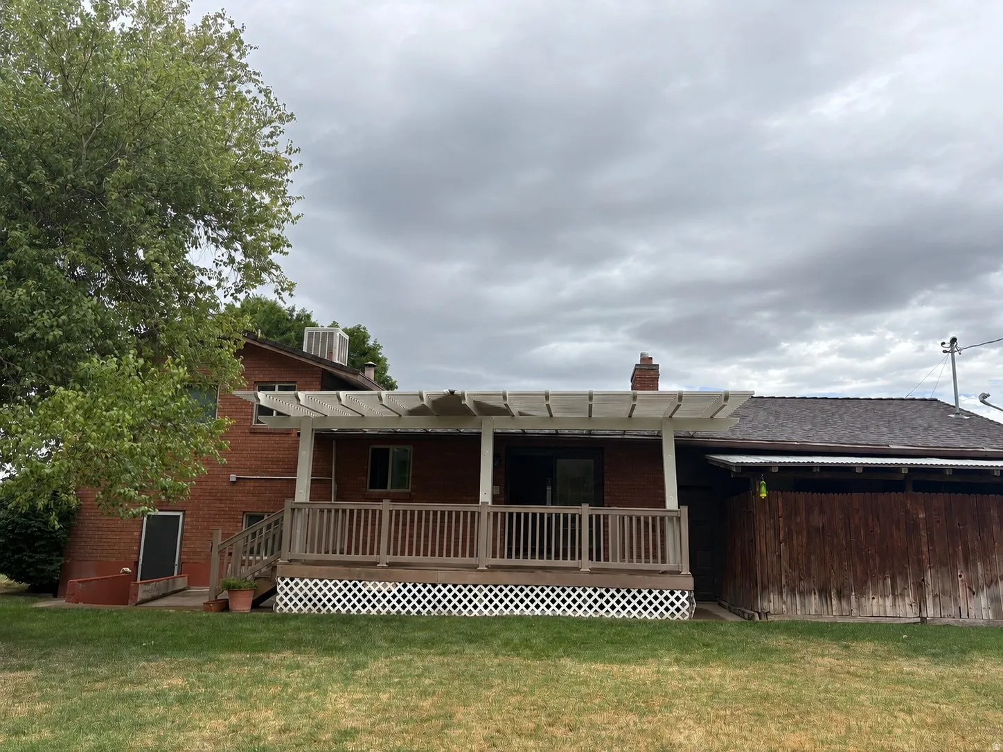 Back of the home showing the covered deck