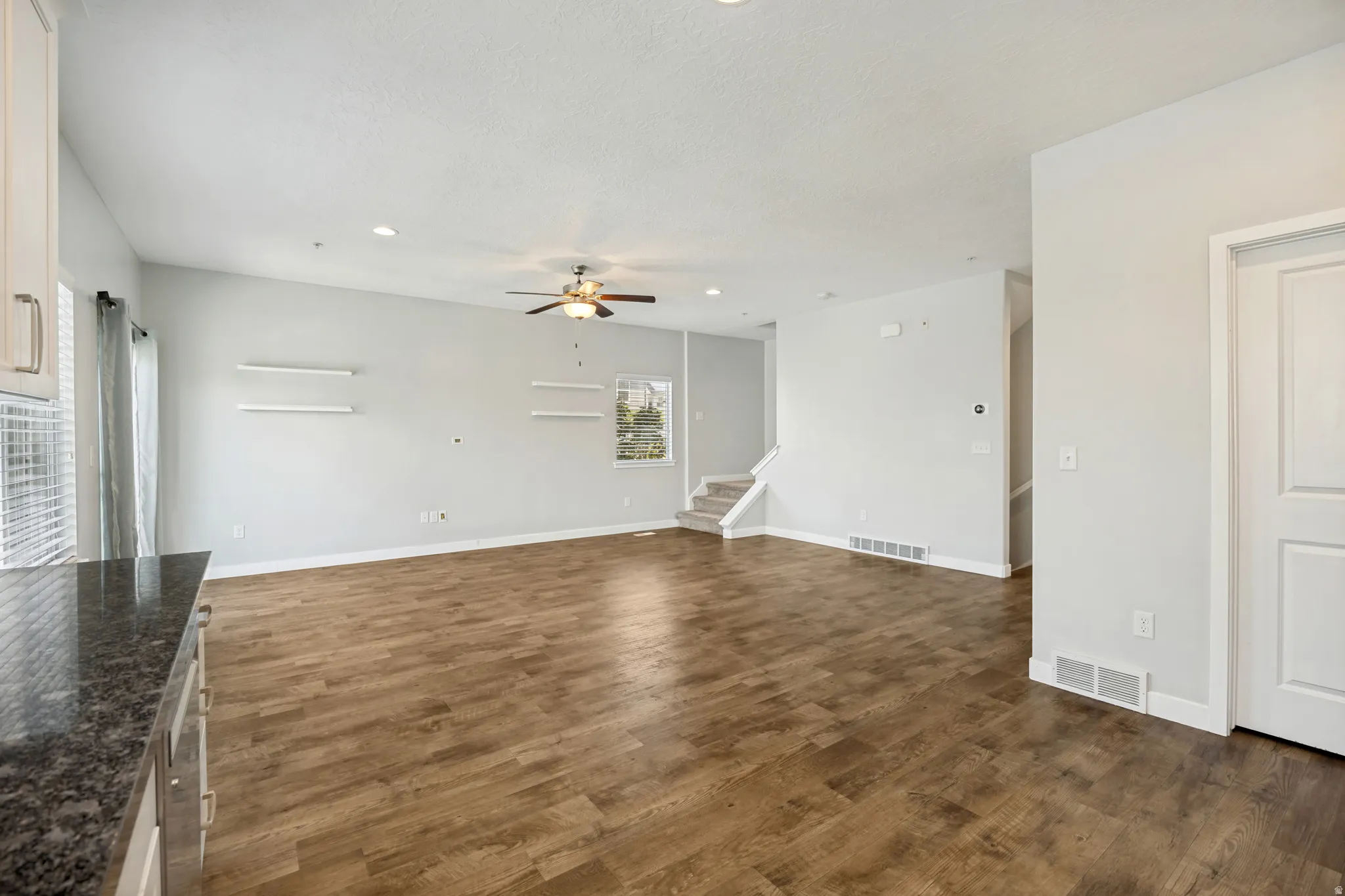 The kitchen flows right into the living room, offering an easy, open-concept space perfect for everyday living.