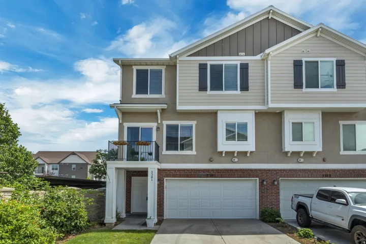 Contemporary end-unit townhome offering a warm, inviting welcome.