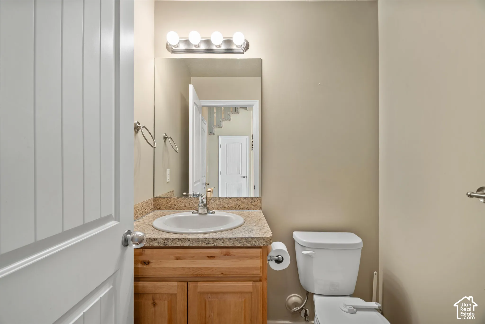 Vanity with a built-in sink and a patterned countertop