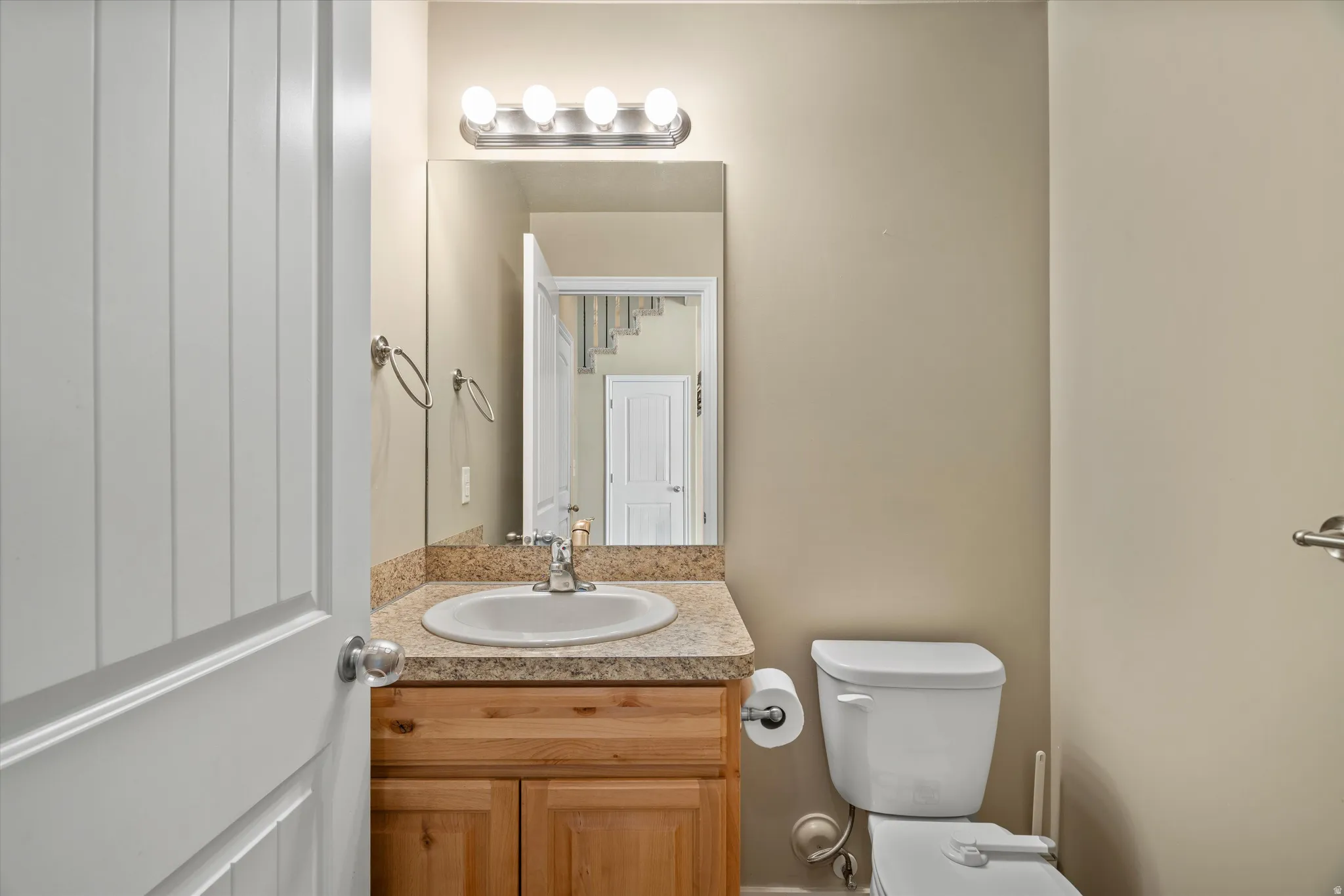 Vanity with a built-in sink and a patterned countertop