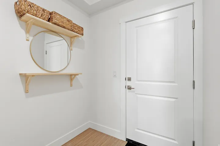 Bright white interior door with brushed nickel hardware