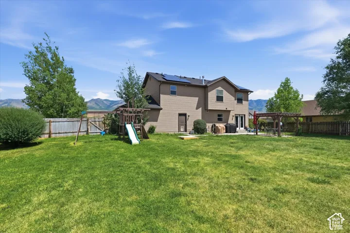 Expansive green lawn providing ample outdoor space