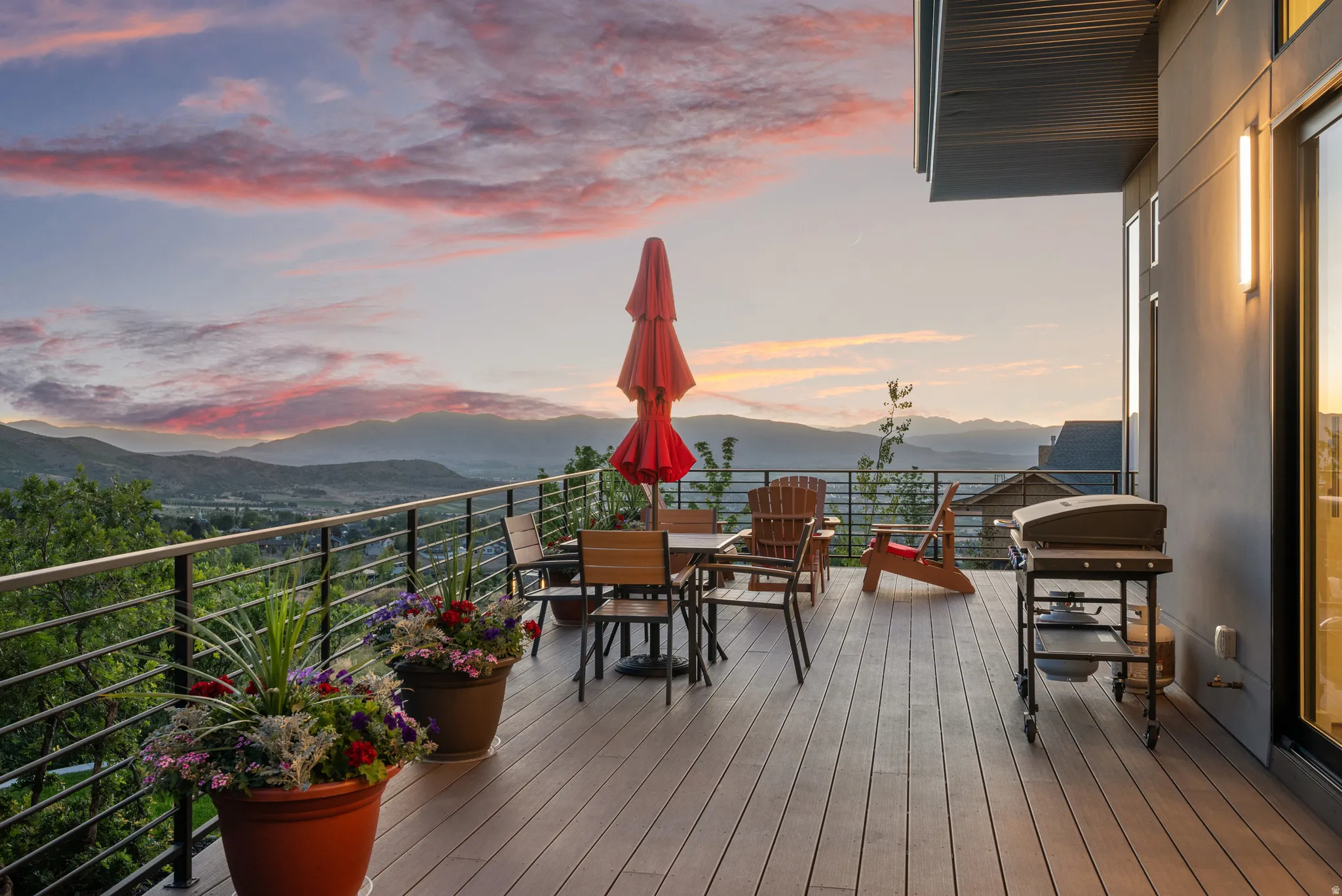 Expansive outdoor deck off the kitchen & dining with amazing views to the mountains and valley